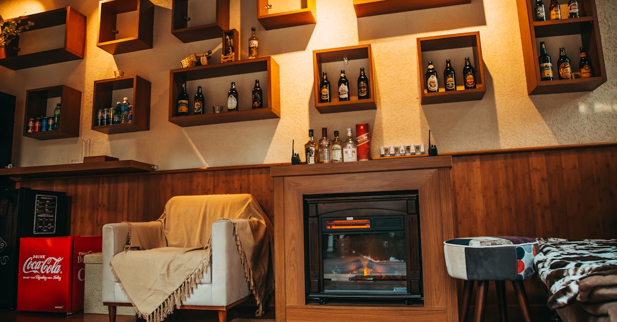 Cozy living room interior with a stylish fireplace and decorative shelving.